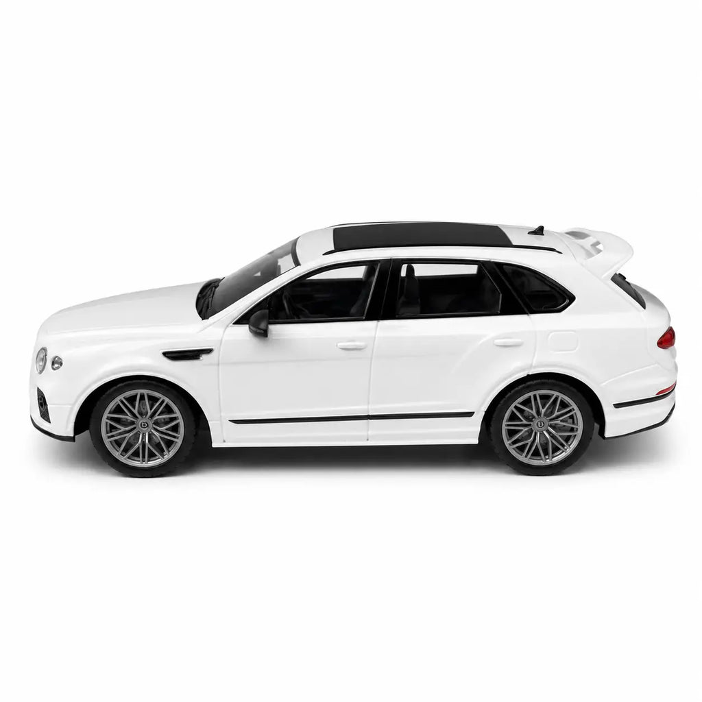 White 1:16 remote control SUV toy car side view on white background