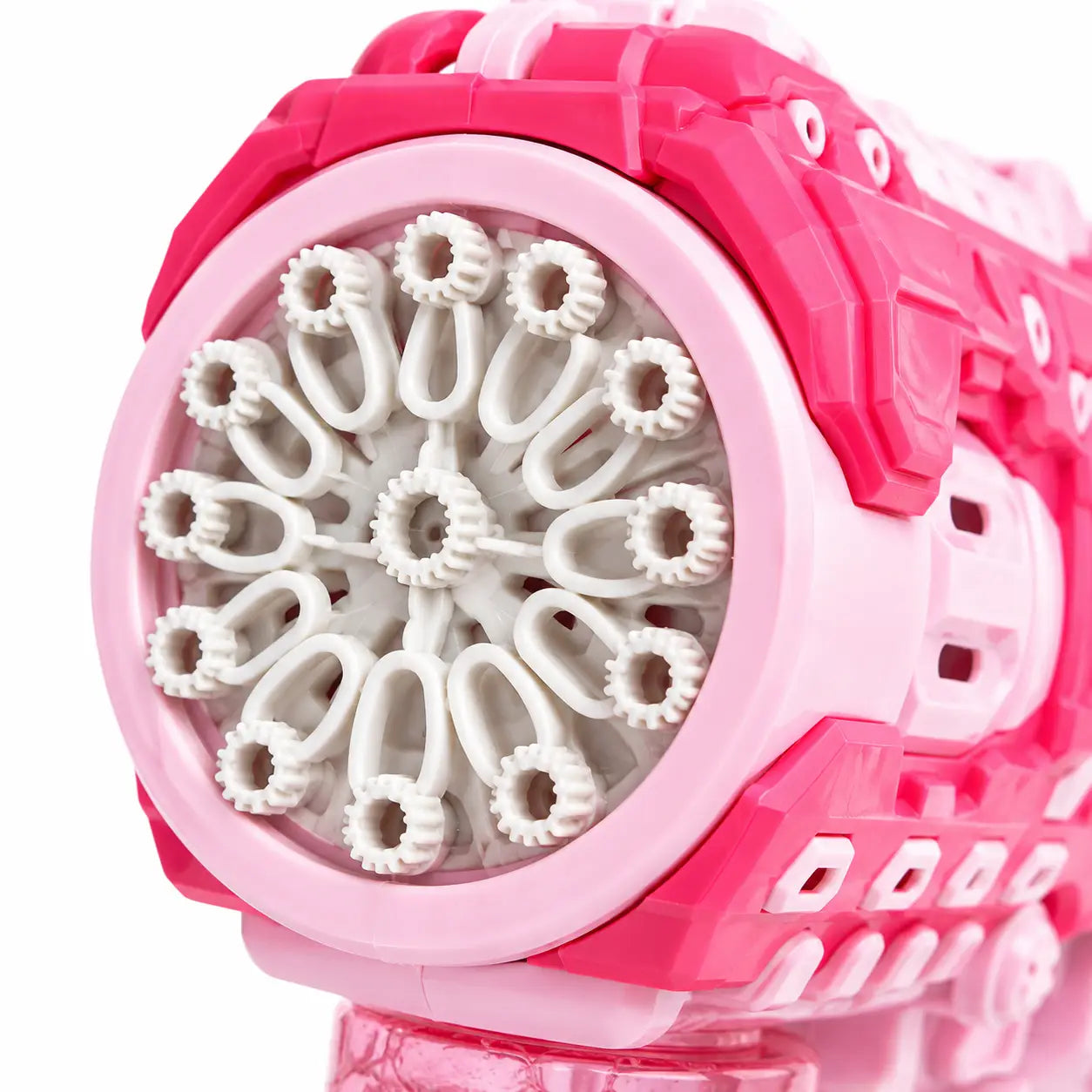 Close-up of a pink and white toy gun-shaped accessory with multiple circular openings and molded plastic details, shown on a plain white background.