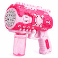 A pink and white toy bubble gun with a clear pink liquid reservoir, shown against a plain white background.