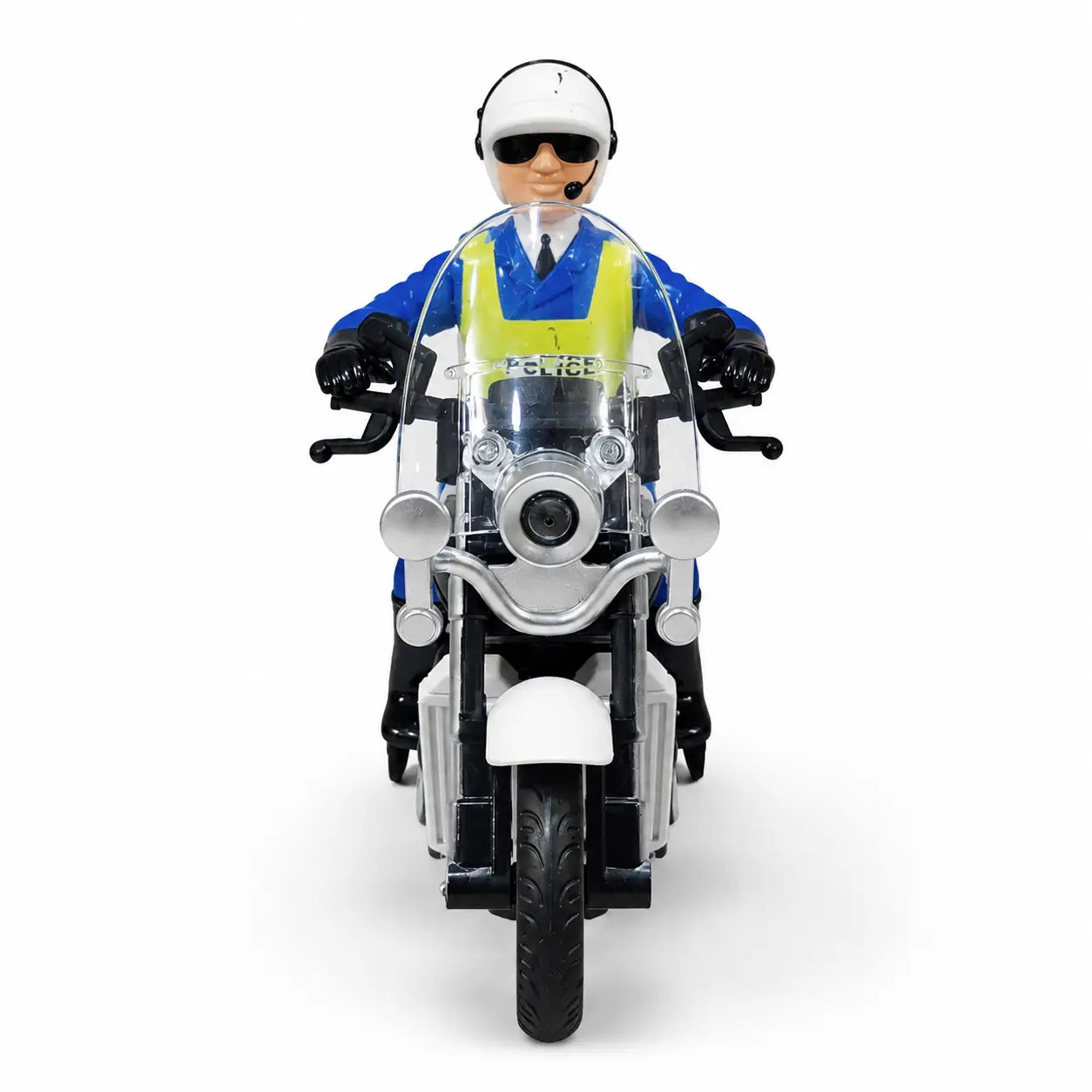 A toy police motorcycle with a toy officer seated on it, photographed against a plain white studio background. The motorcycle is silver and black with a clear windshield, and the officer wears a white helmet, dark sunglasses, a blue uniform, and a high-visibility yellow vest.
