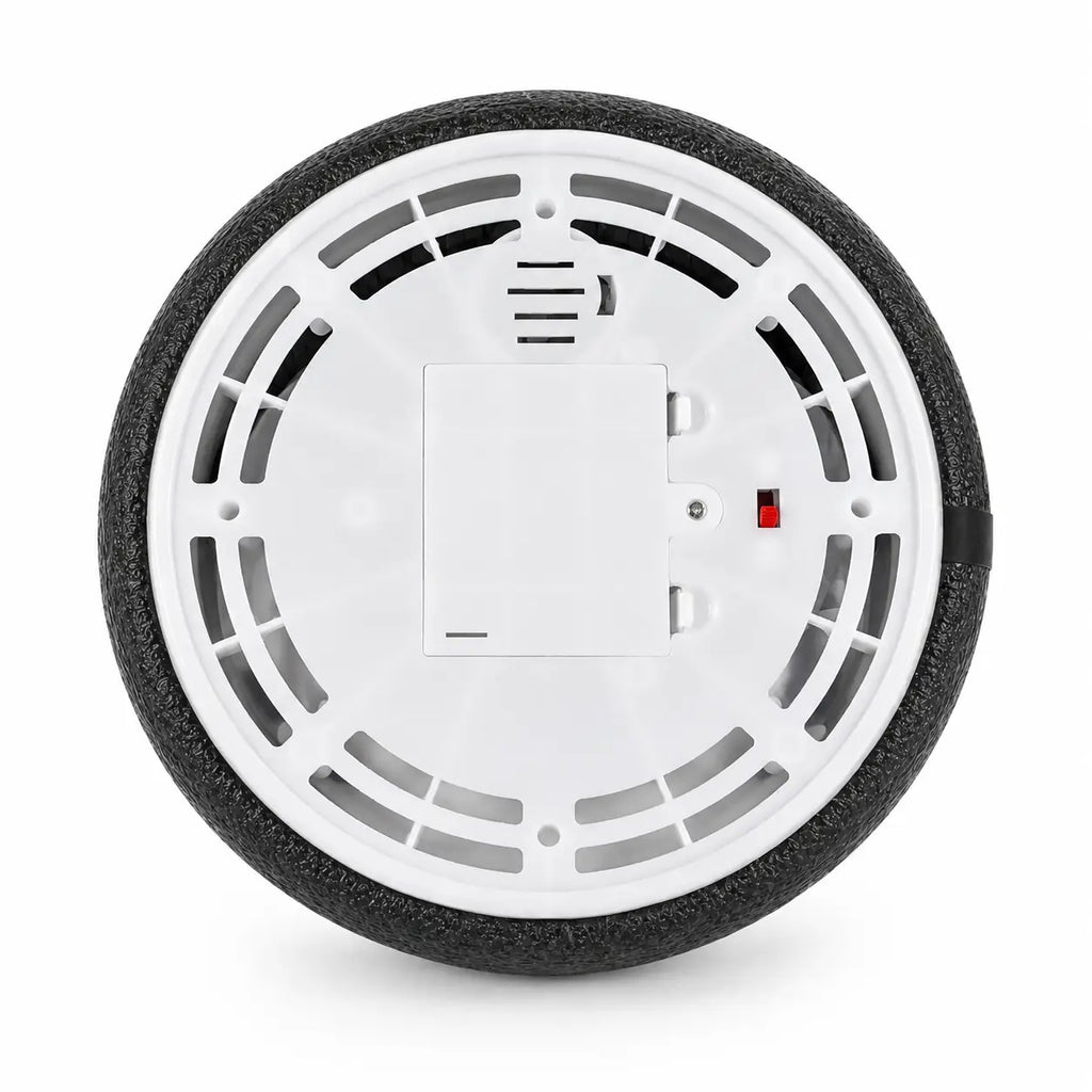Bottom view of battery-operated hover soccer ball showing air vents, switch and battery compartment