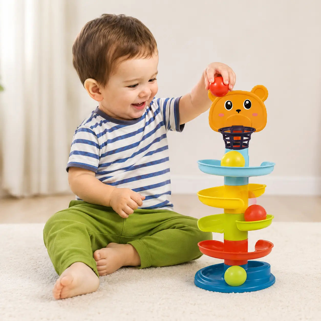 Child playing with Huanger Roll Ball Tower Toy for toddlers aged 18 months and above