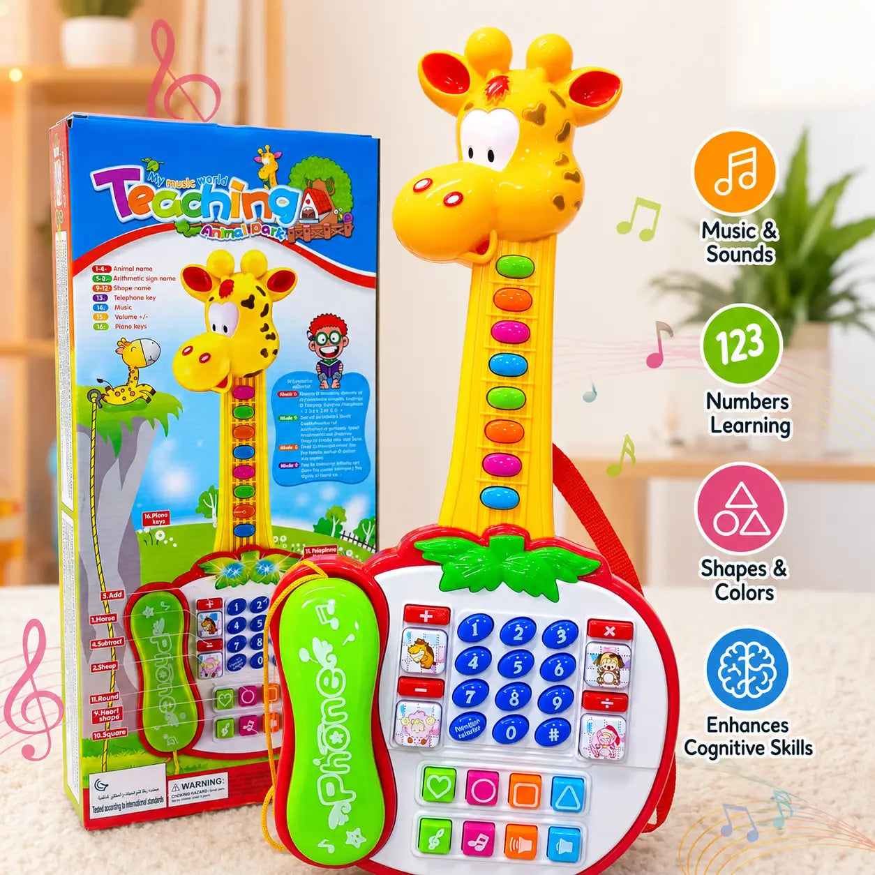 A giraffe-shaped toy phone learning instrument shown with its retail box and a remote control, set against a softly blurred indoor background. The right side includes feature callouts with icons for music and sounds, numbers learning, shapes and colors, and cognitive skills.