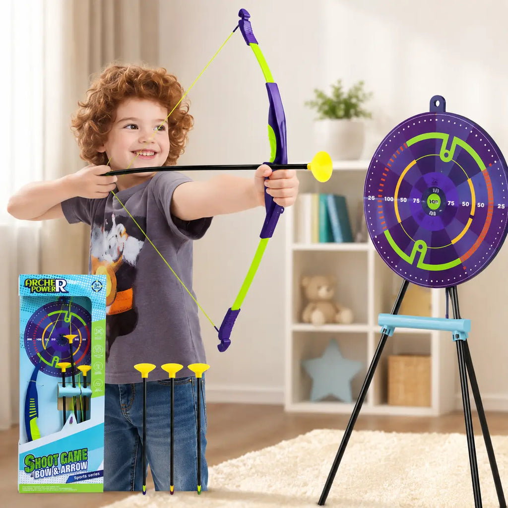 Child playing with kids bow and arrow shooting game using suction cup arrow and colourful target
