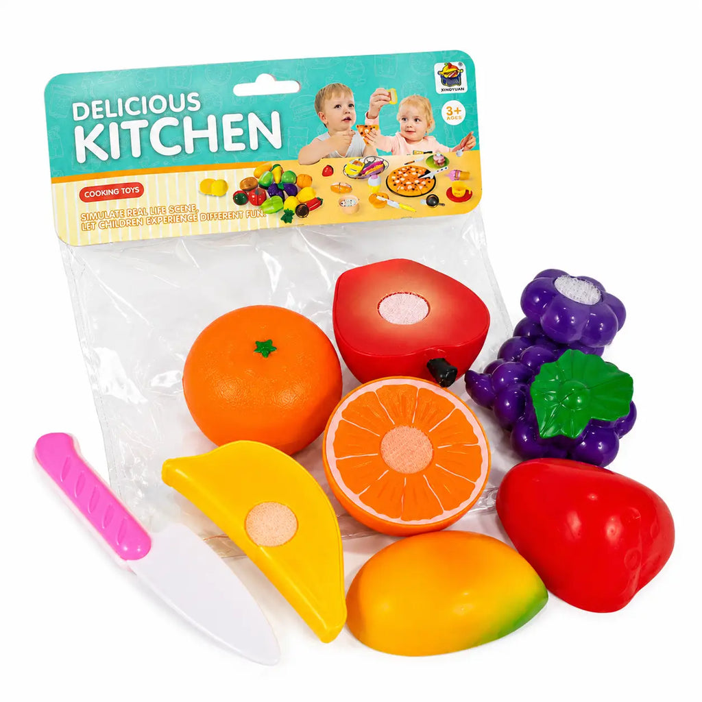 Kids cutting fruit toy set with colorful pretend fruits and toy knife displayed outside opened packaging