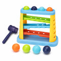 Colourful kids hammering pounding ball toy with rolling ramps, four balls and toy hammer