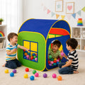 Children playing with colourful pop-up play house tent and plastic balls indoors