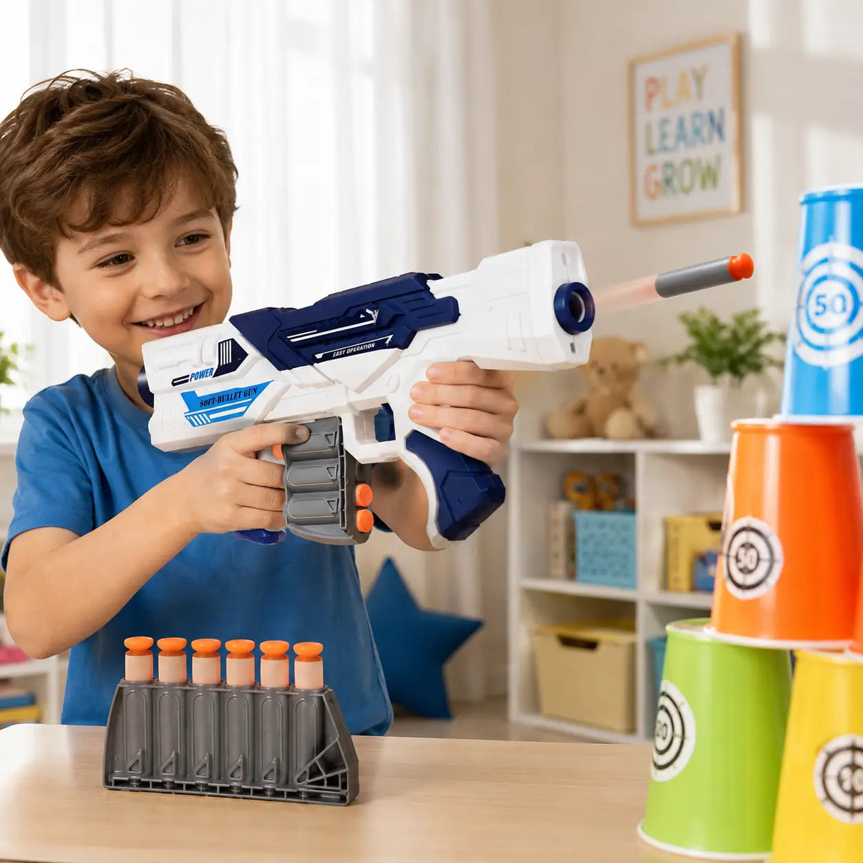 Boy playing with white and blue kids soft bullet gun toy with foam darts for indoor target play