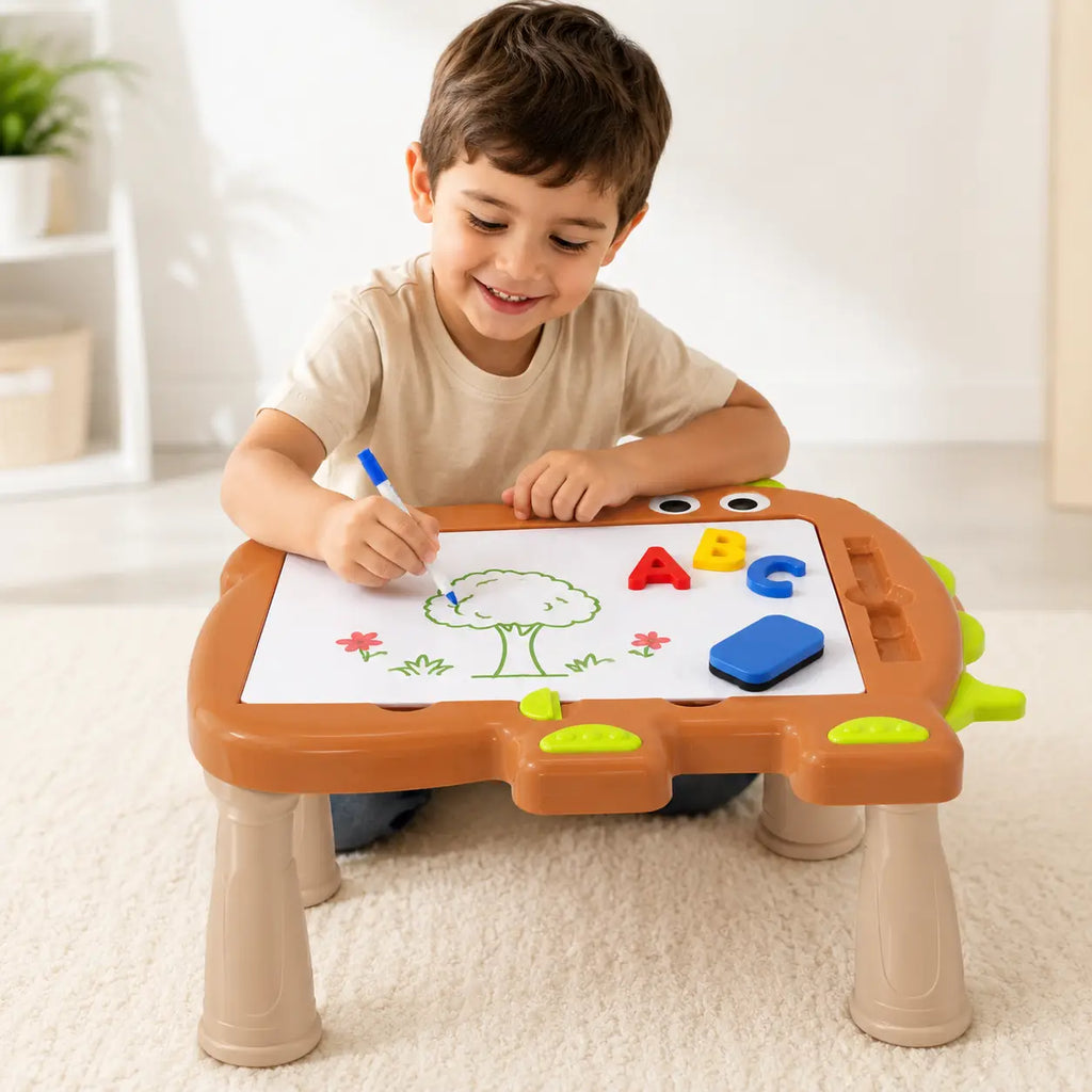 Child drawing and learning with 3-in-1 kids magnetic writing board desk with colorful alphabet letters