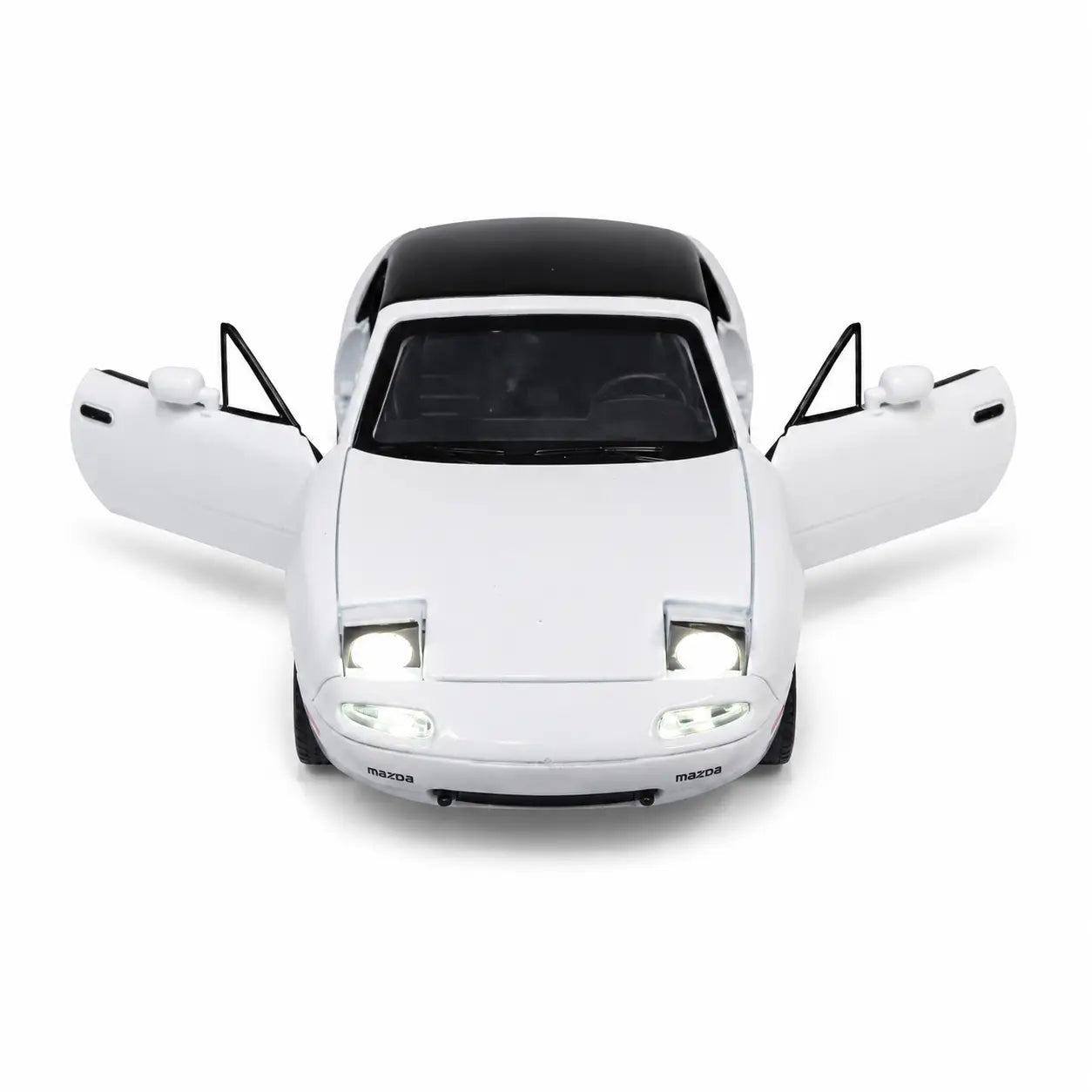 White Mazda MX-5 model car with both doors open and front lights illuminated