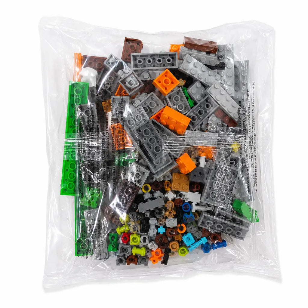 Transparent packet of grey orange green and brown building pieces for My World 837 Zombie Cave 253+ piece set
