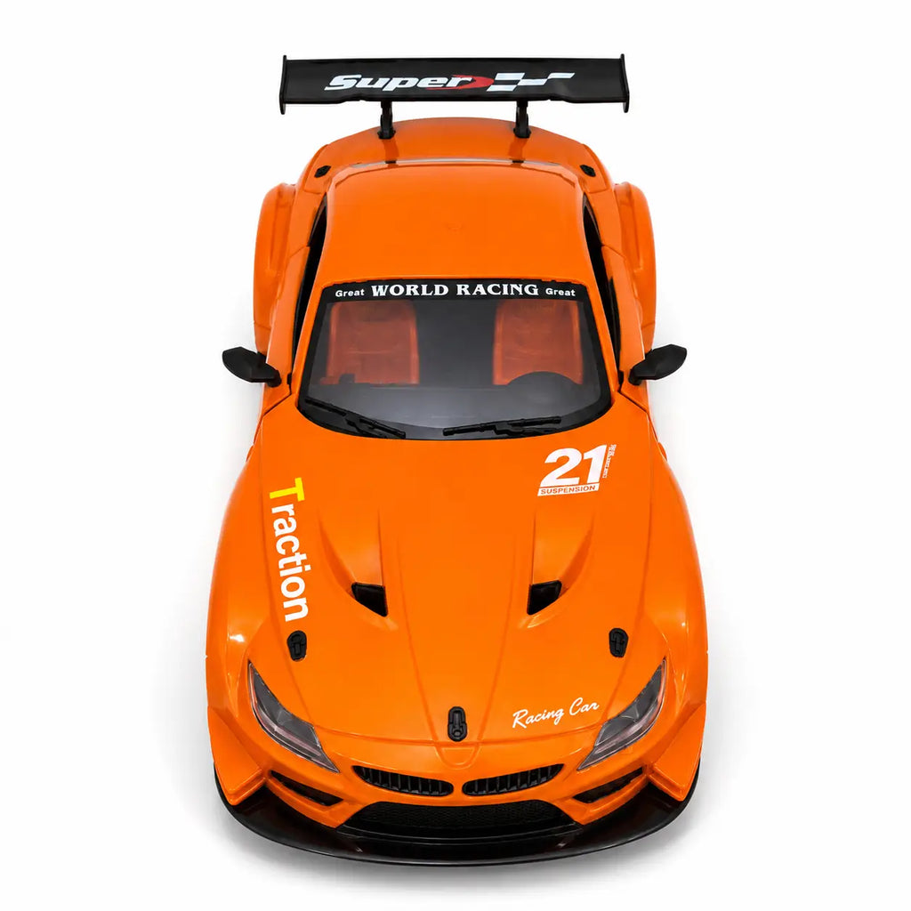Top front view of orange RC racing sports car with racing graphics and rear spoiler