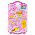 A children's toy doctor playset in a bright pink carrying case, featuring a pink stethoscope, yellow medical tools, a pink thermometer, scissors, and a heart-shaped mirror, with a small 'Doctor' box inside the case.