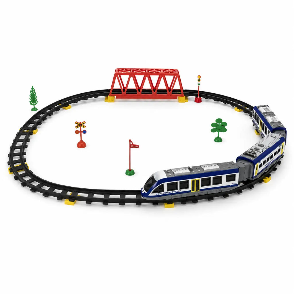Remote control express train running on assembled oval track with red railway bridge and scenery