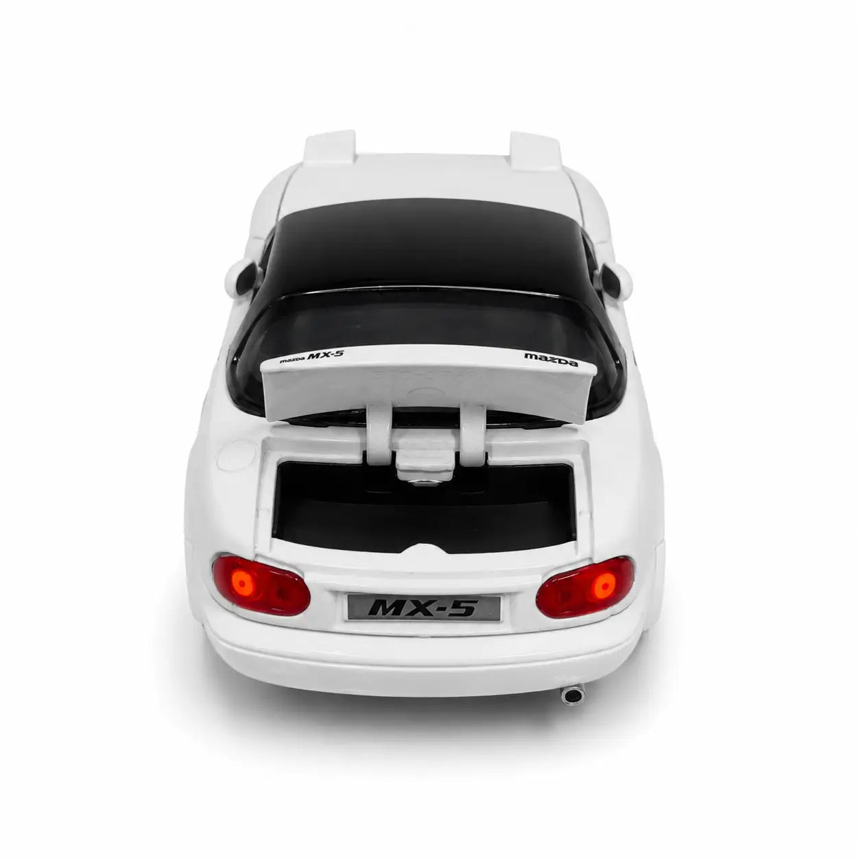 White Mazda MX-5 die-cast model car rear view with opening trunk